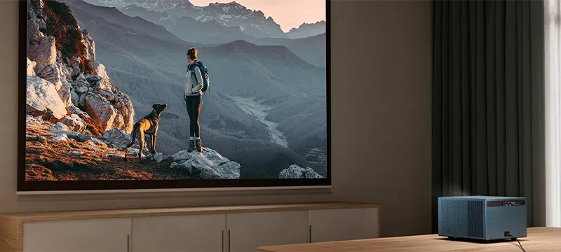 a projector on a table in a living room